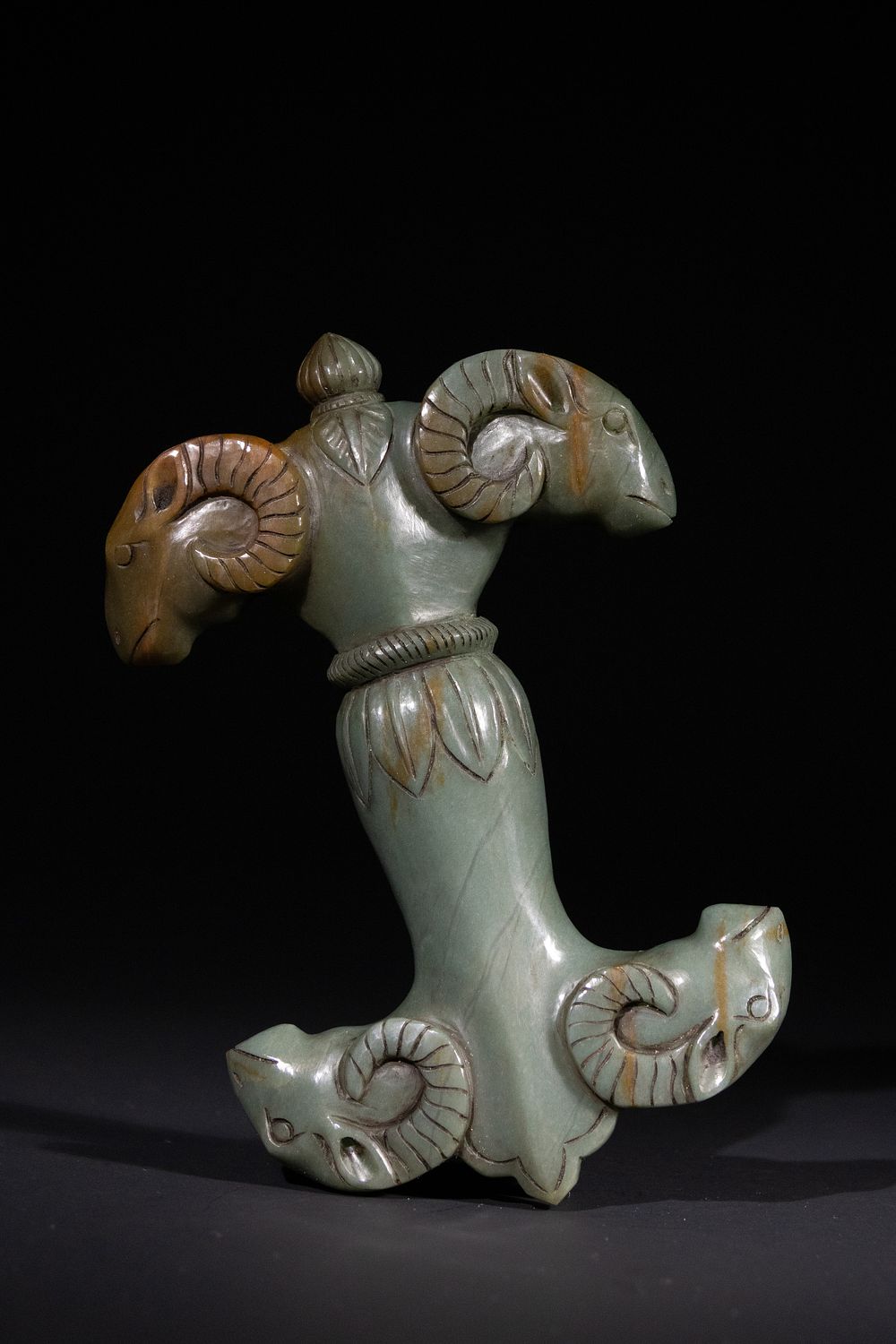 Lot 178: A Mughal Jade Dagger Hilt with Four Ram’s...