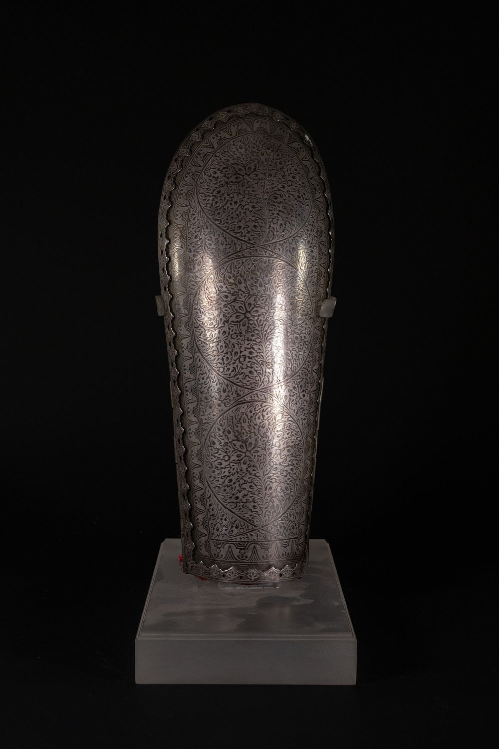 Lot 185: An Indian Steel Arm Guard with Floral Engravings,...