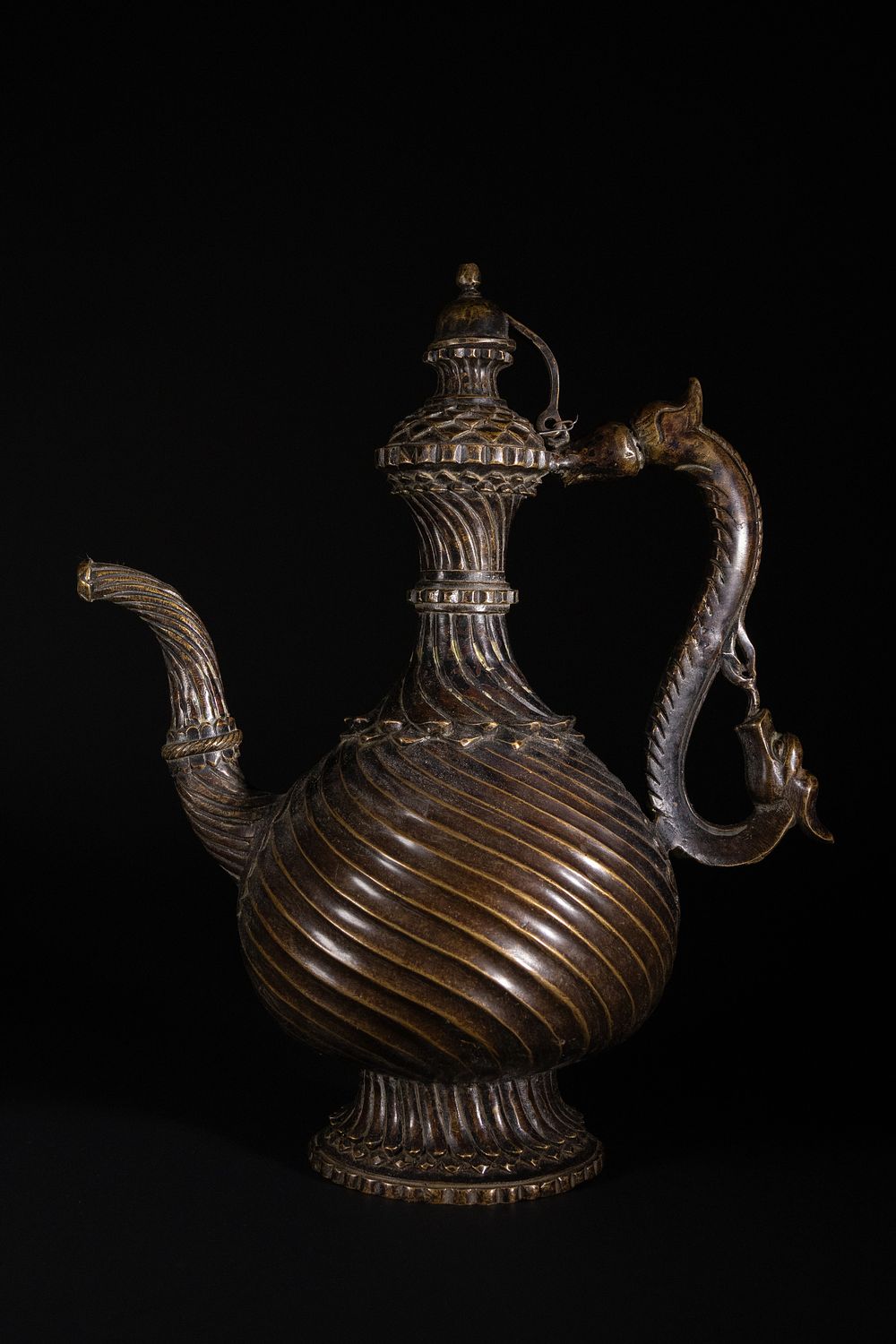 Lot 187: A Mughal Bronze Ewer with Dragon Handle, 16th-18th...