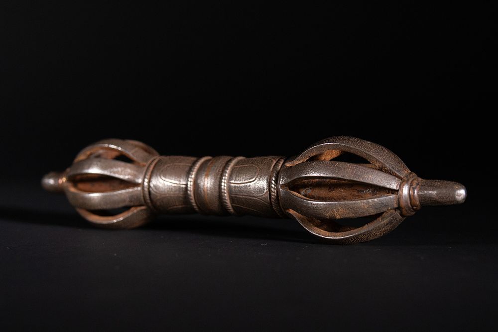 Lot 227: A Tibetan Iron Vajra with Copper Inlay.