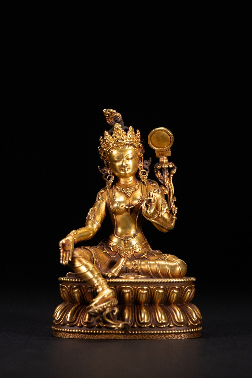 Lot 234: A Tibetan Gilt Bronze Figure of Tara.