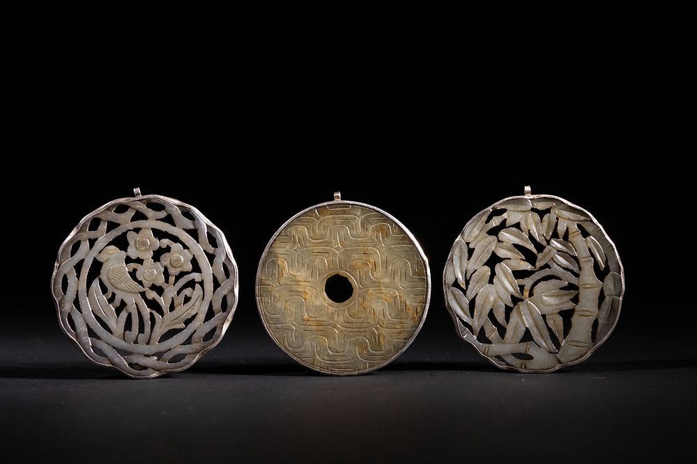 Lot 275: A Lot of Three Chinese Jade Pendants.