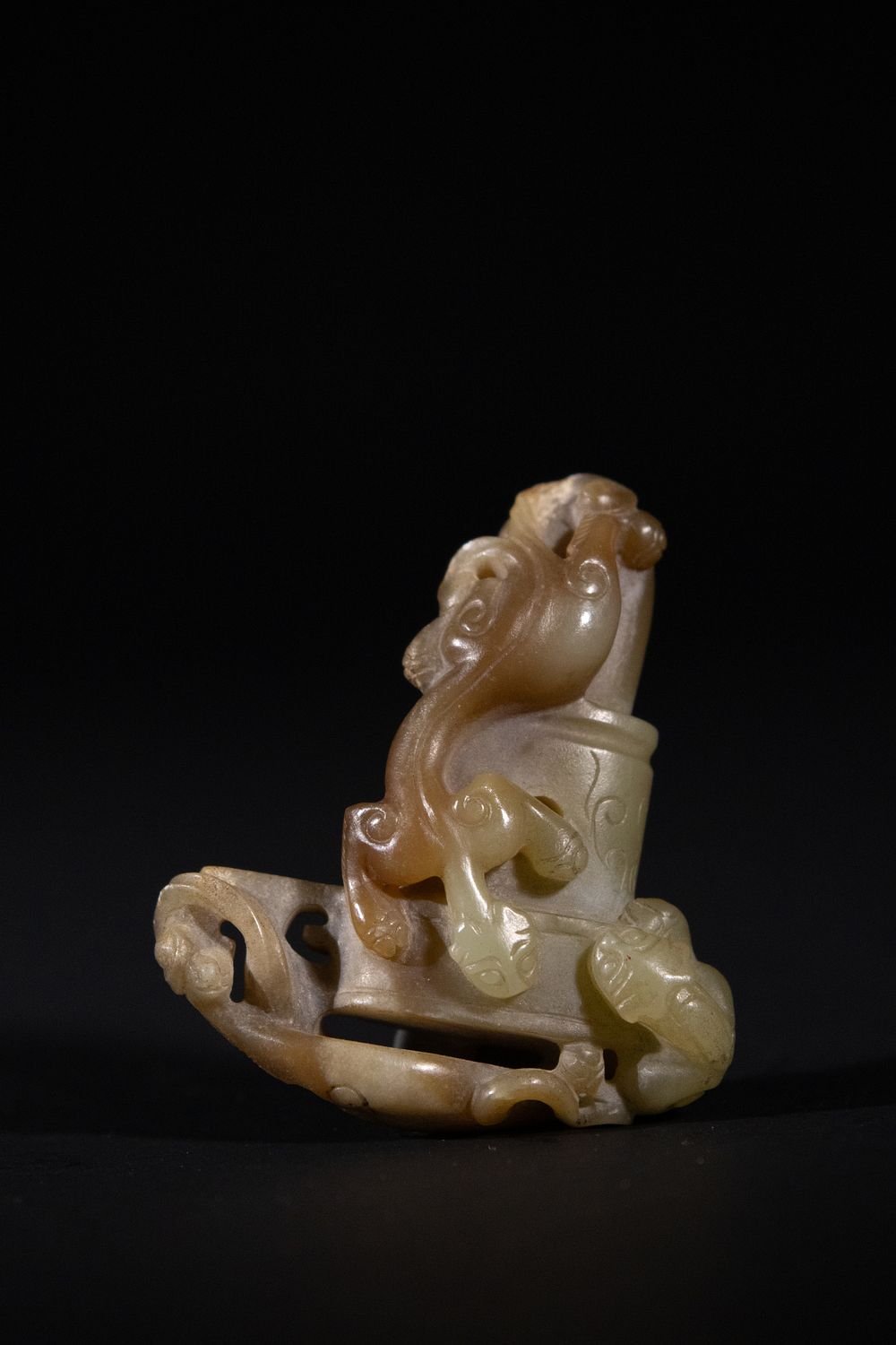 Lot 282: A Chinese Russet and Celadon Jade Openwork Plaque...