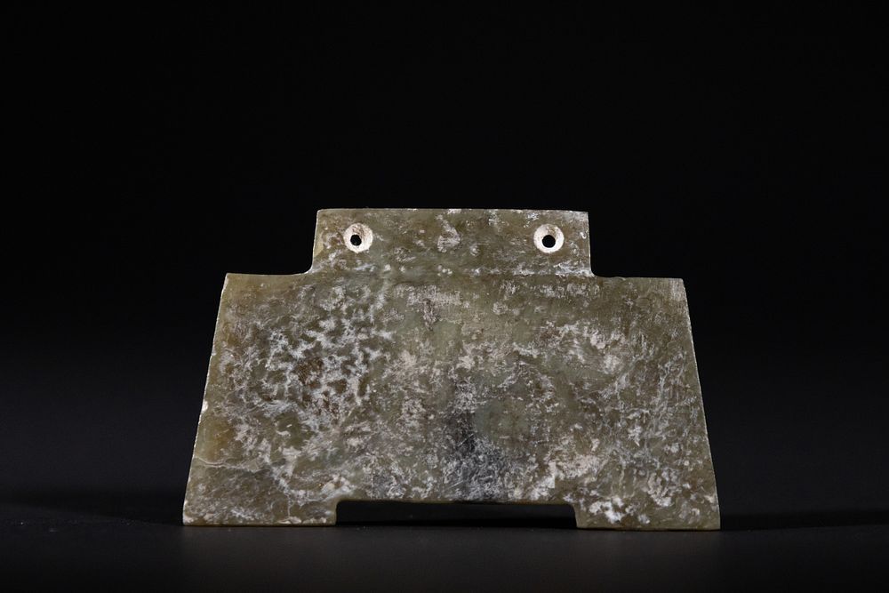 Lot 286: A Chinese Jade Ritual Blade with Twin Suspension...