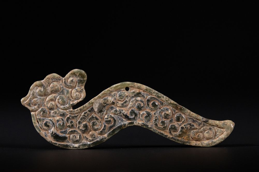 Lot 287: A Chinese Archaic Green Jade Dragon Pendant, 18-19th...