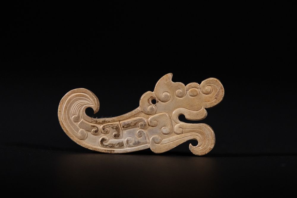 Lot 288: A Chinese Carved Jade Dragon Pendant, 19th-20th Century.