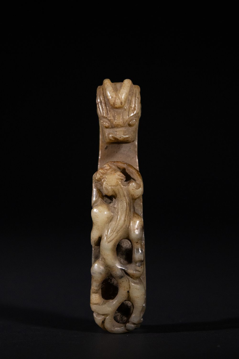 Lot 289: A Chinese Celadon Jade Belt Hook with Dragon...