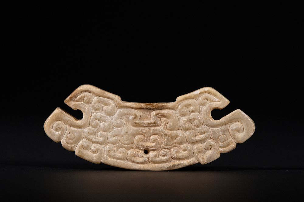 Lot 290: A Chinese Archaic Jade Pendant with C-Scroll Motifs,...