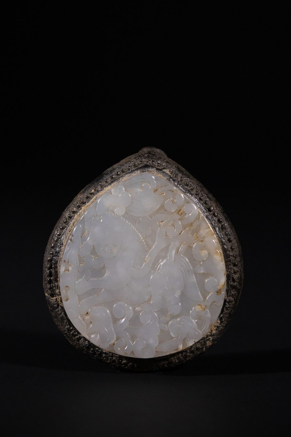 Lot 295: A Chinese White Jade Openwork Belt Plaque.