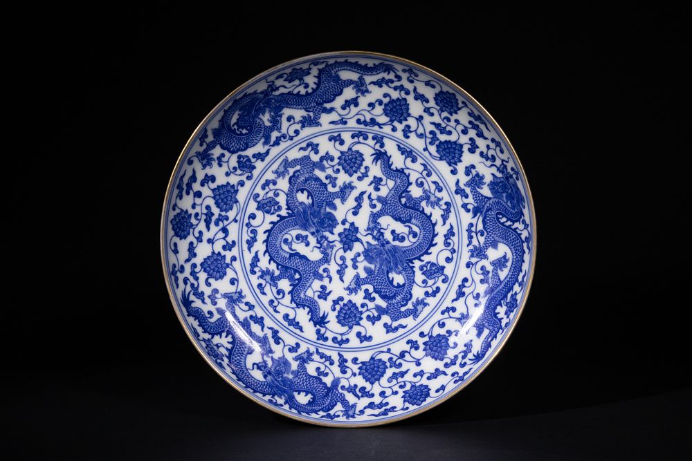 Lot 297: A Chinese Blue and White ‘Five-Dragon’ Porcelain Dish.