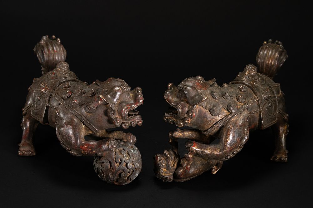 Lot 329: A Pair of Chinese Bronze Guardian Lions.