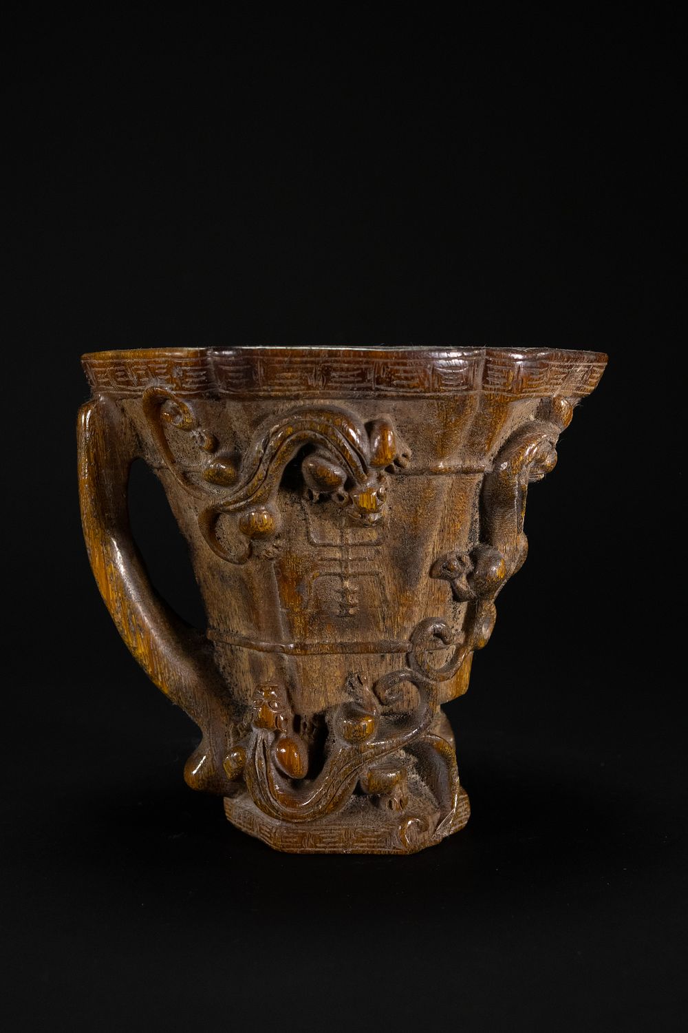 Lot 332: A Chinese Libation Cup with Archaistic Dragon Motifs...