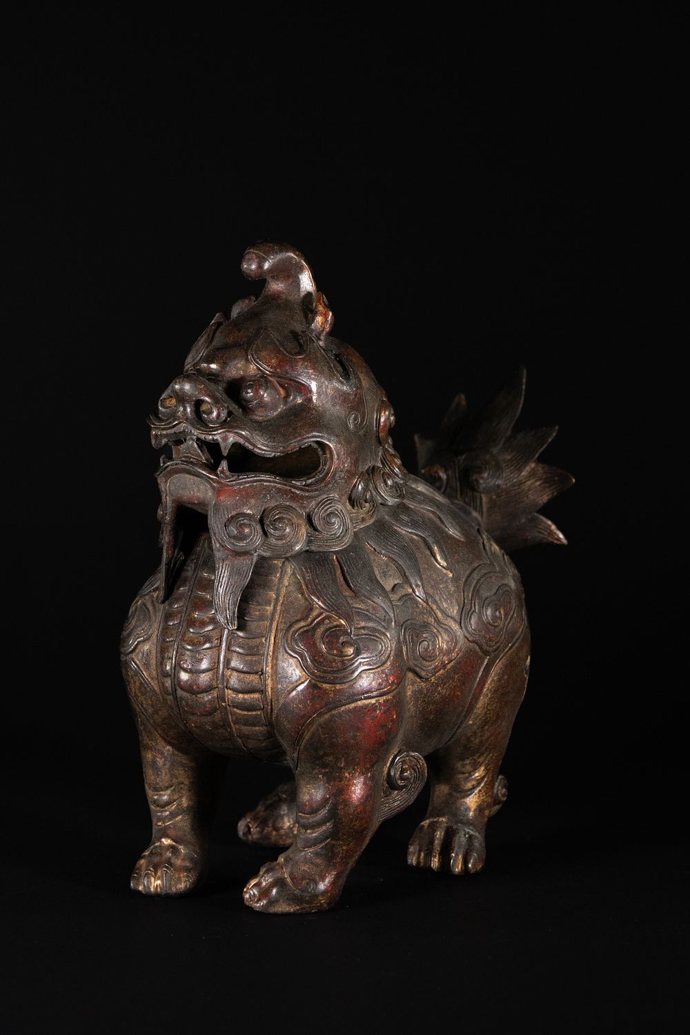 Lot 338: A Chinese Gilt-Bronze Figure of a Qilin with...