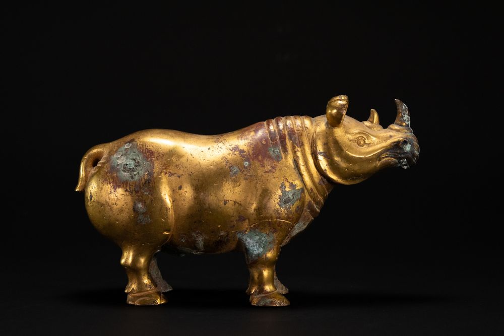Lot 339: A Chinese Gold Gilt-Bronze Figure of a Rhinoceros,...