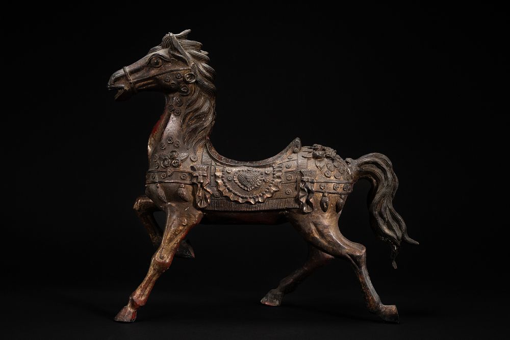 Lot 342: A Chinese Gilt-Bronze Model of a Caparisoned Horse.
