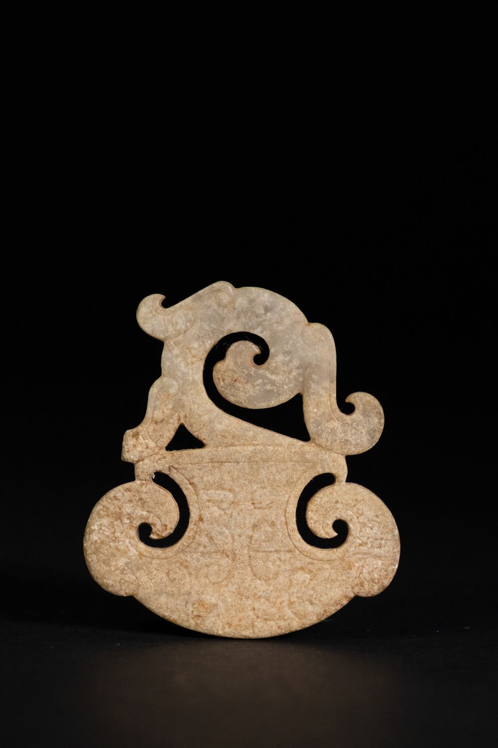 Lot 358: A Warring States Period Jade Pendant Carved as...