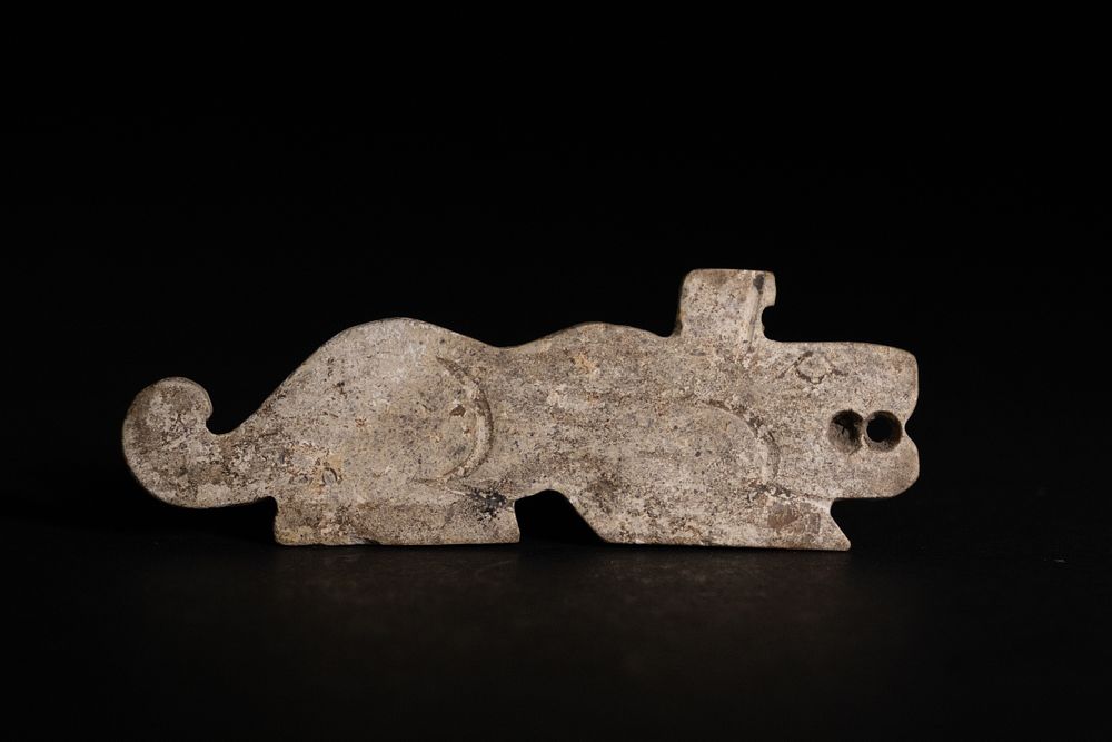 Lot 360: A Shang Dynasty Jade Tiger Amulet in Crawling...
