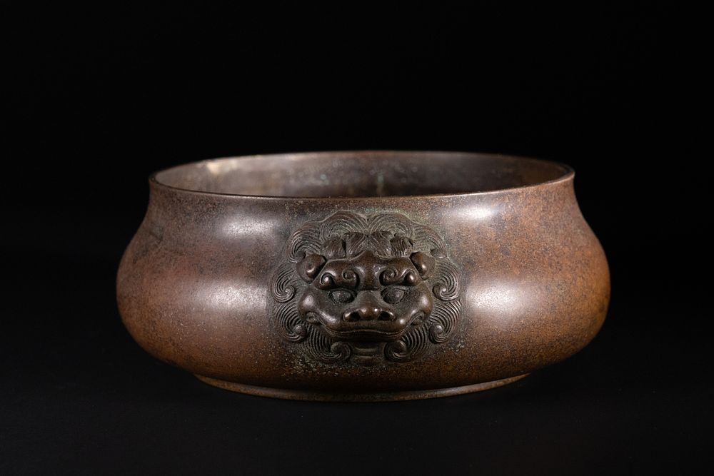Lot 362: A Chinese Bronze Tripod Censer with Lion Head...
