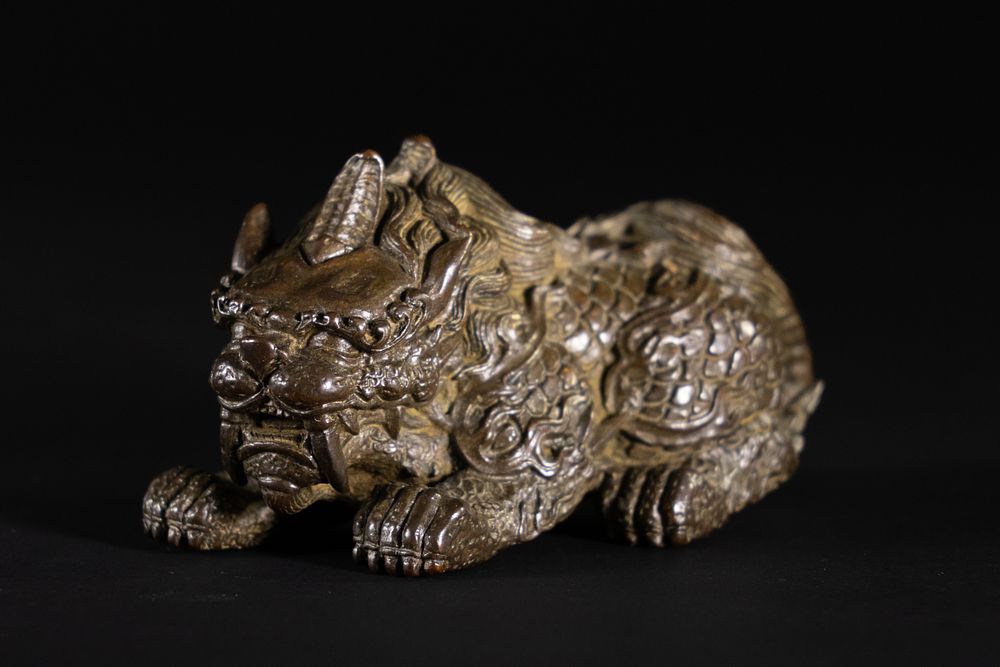 Lot 387: A Japanese Bronze Mythical Beast Figure, Signed.