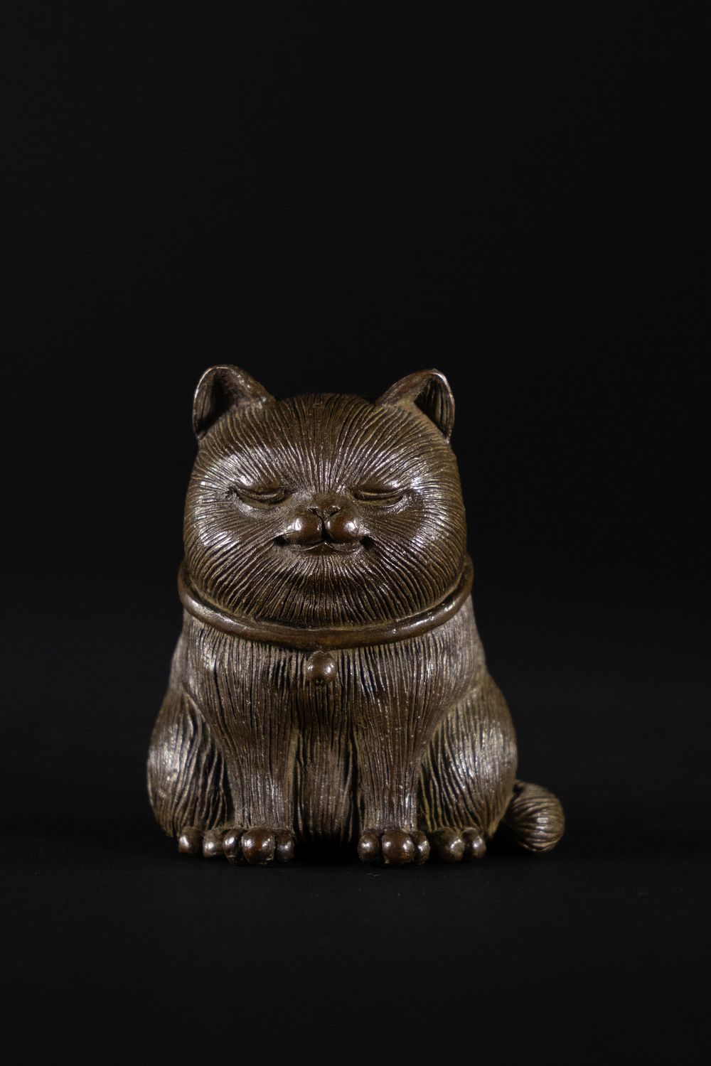 Lot 389: A Japanese Bronze Figure of a Seated Cat...