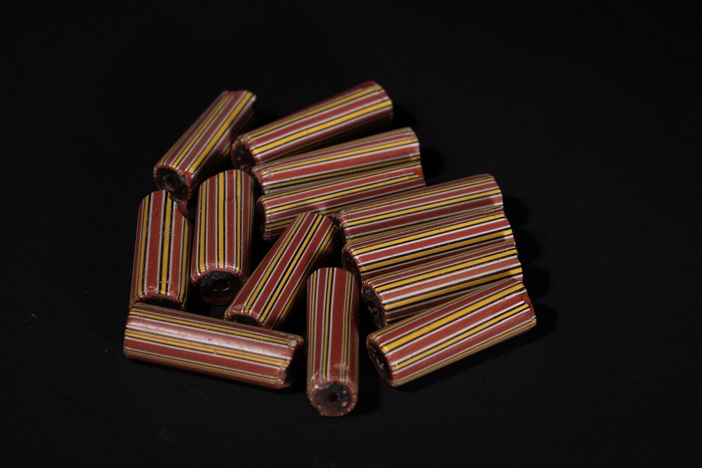 Lot 395: A Lot of 13 Millefiori African Trade Beads.