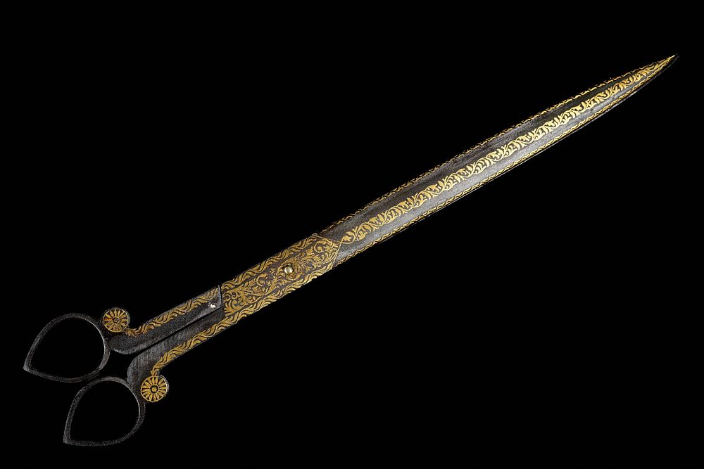 Lot 157: An Ottoman Gold-Inlaid Iron Scissor-Kard, 19th–20th Century.