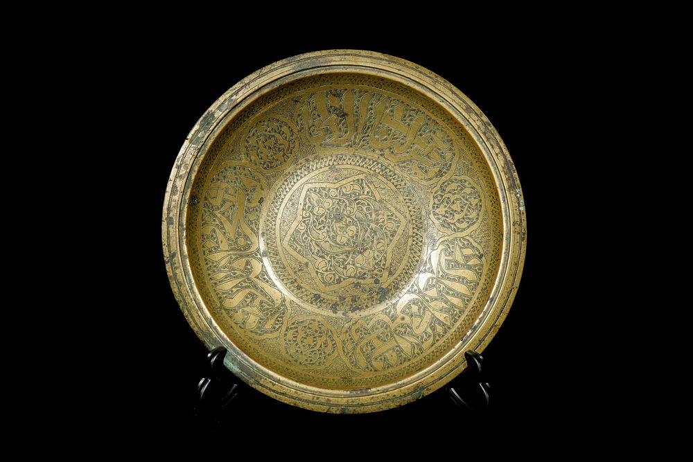 Lot 162: A Brass Bowl with Engraved Arabic Panels, Syrian...