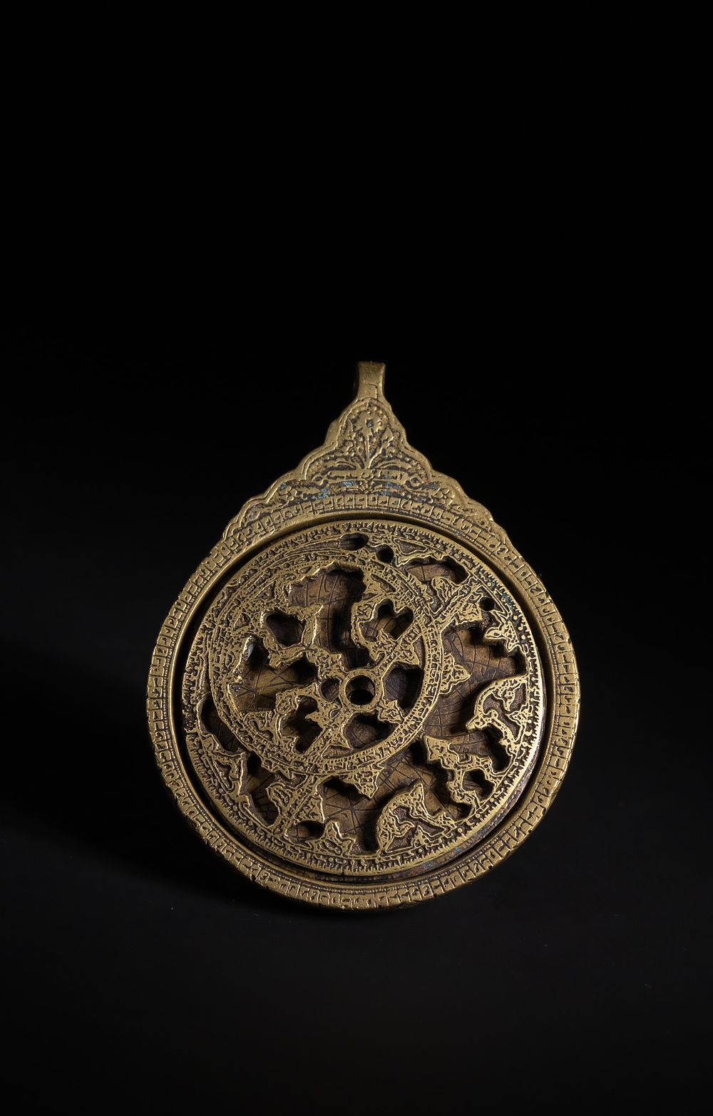 Lot 172: An Islamic Brass Astrolabe with Openwork Rete and...