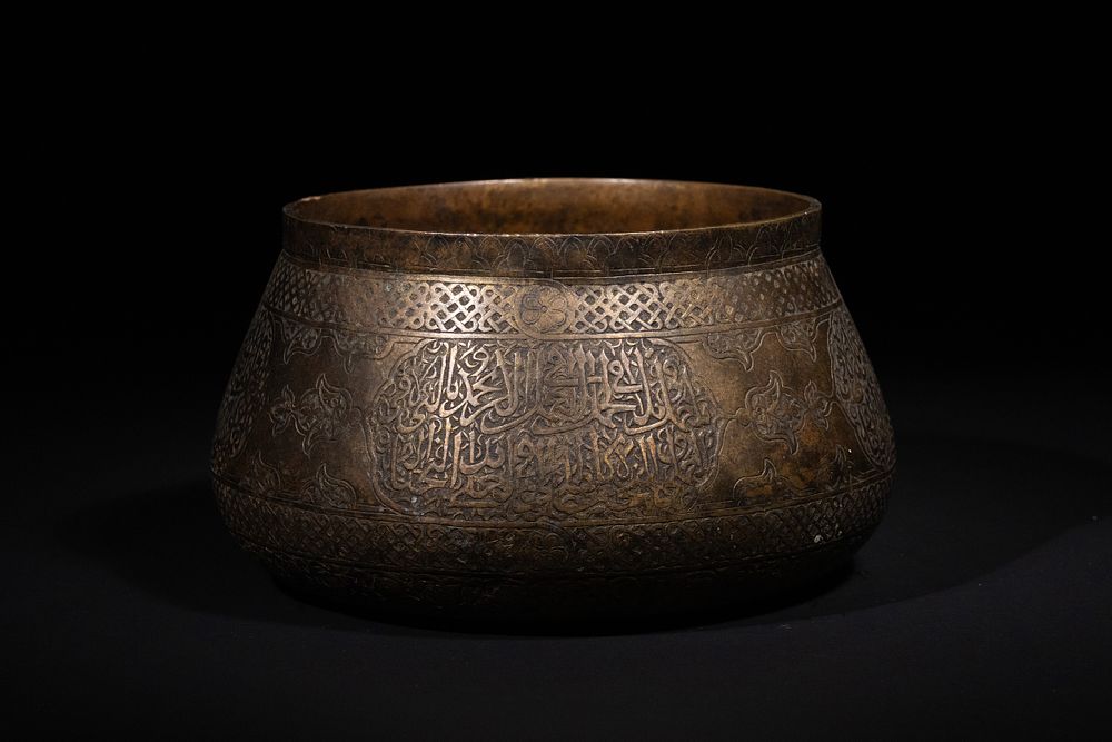 Lot 182: A Mamluk Copper Bowl with Arabic Inscriptions, 14th–15th...