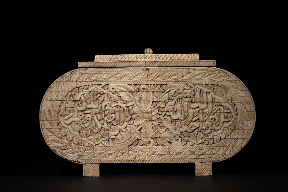 Lot 183: An Islamic Bone Carved Lidded Box with Arabic...