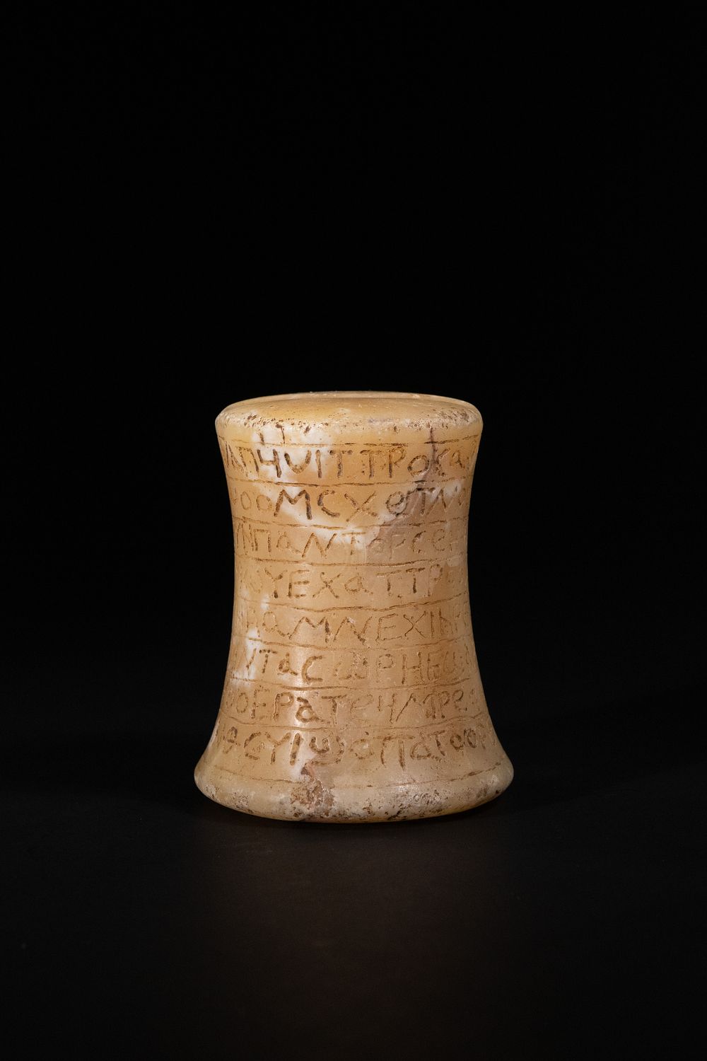 Lot 186: A Bactrian Greek–Style Inscribed Alabaster Votive.