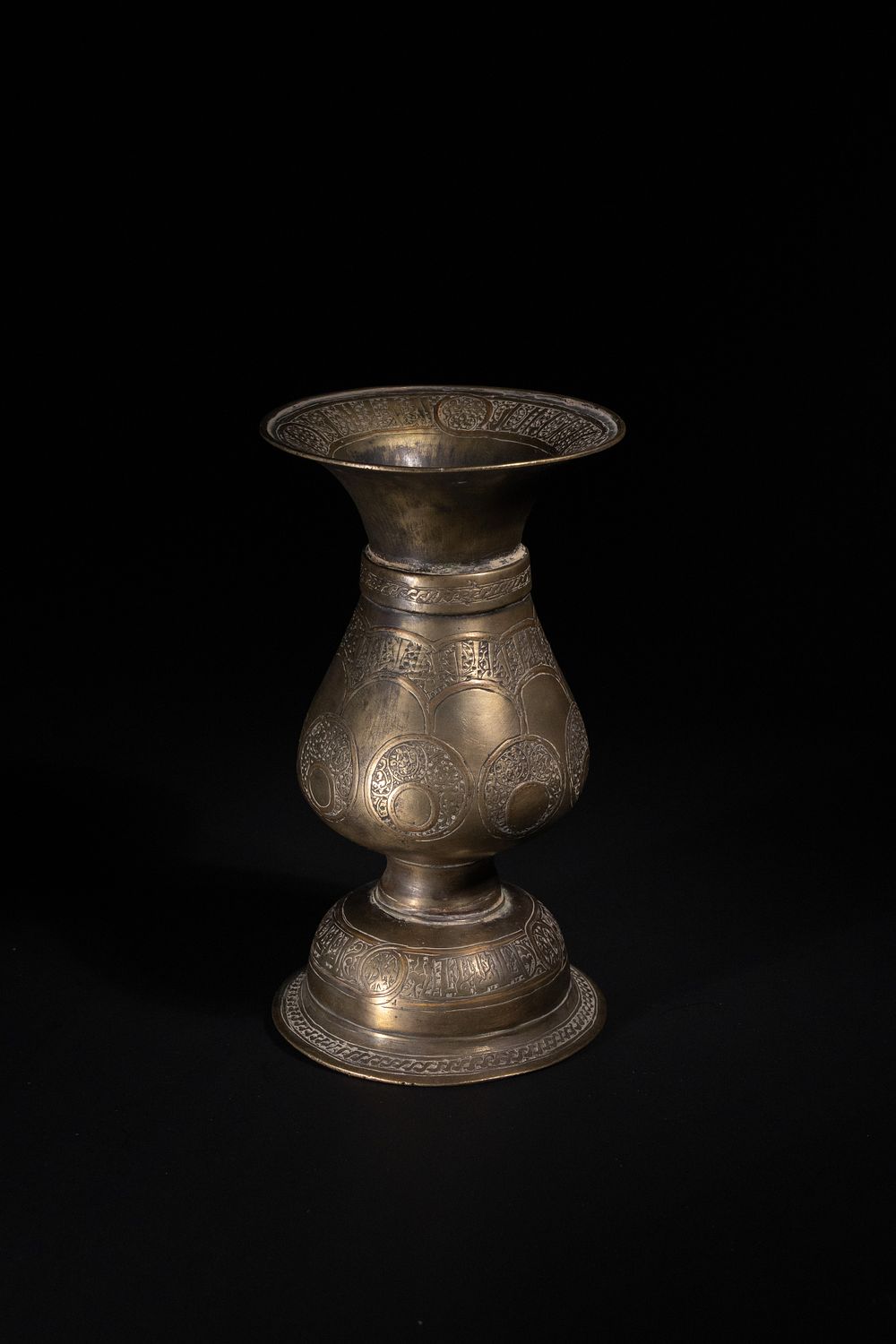 Lot 188: A Khorasan Copper-Inlaid Bronze Vase with Kufic Inscriptions,...