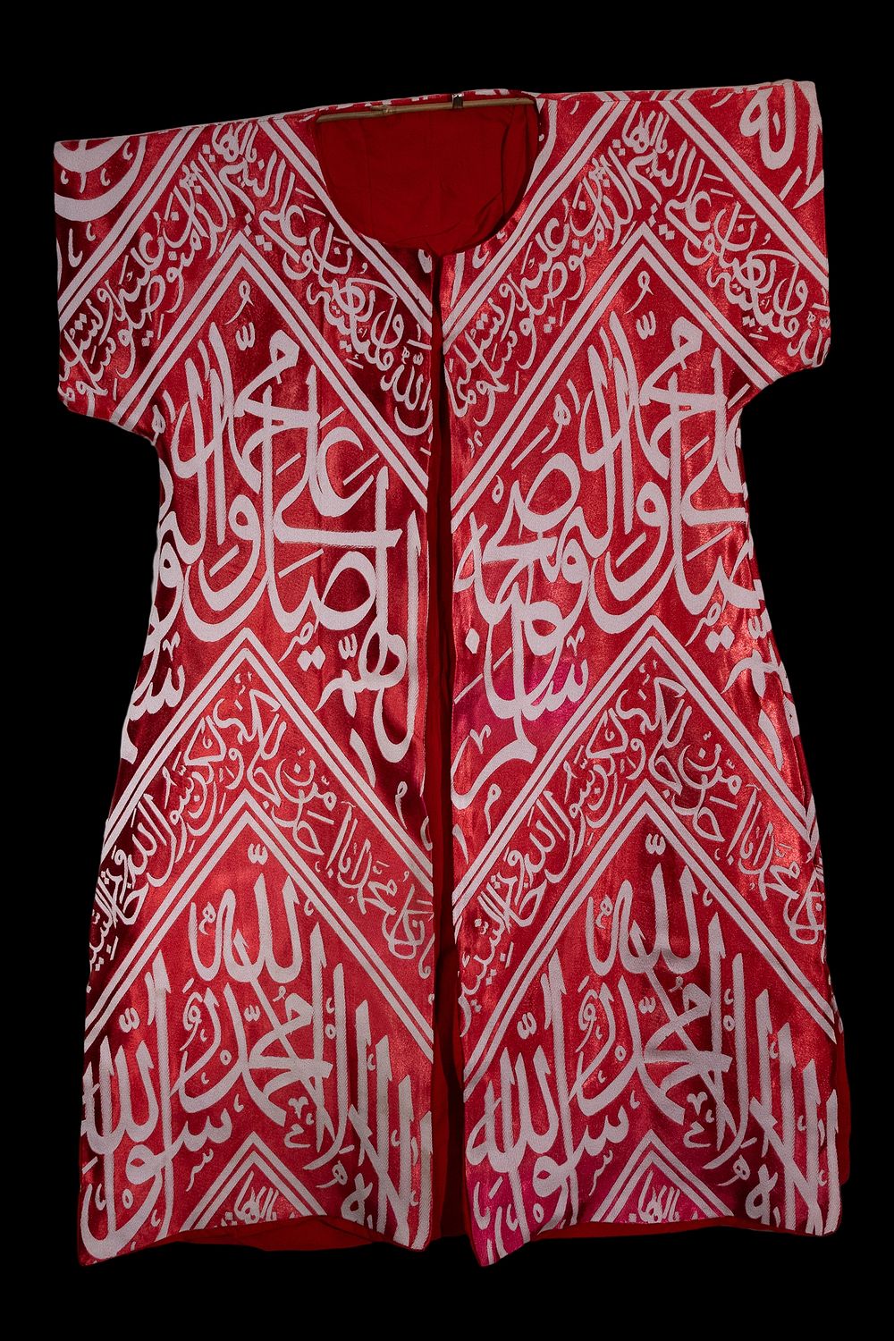 Lot 191: An Ottoman Red Silk Talismanic Shirt with White...