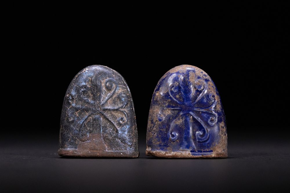Lot 194: A Pair of Fatimid Glazed Ceramic Chess Pieces,...