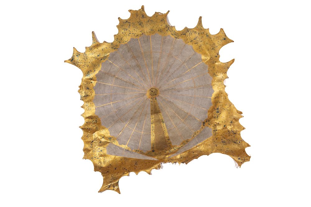 Lot 196: A Rare Gilded Miniature Qur’an Scroll on Vellum.