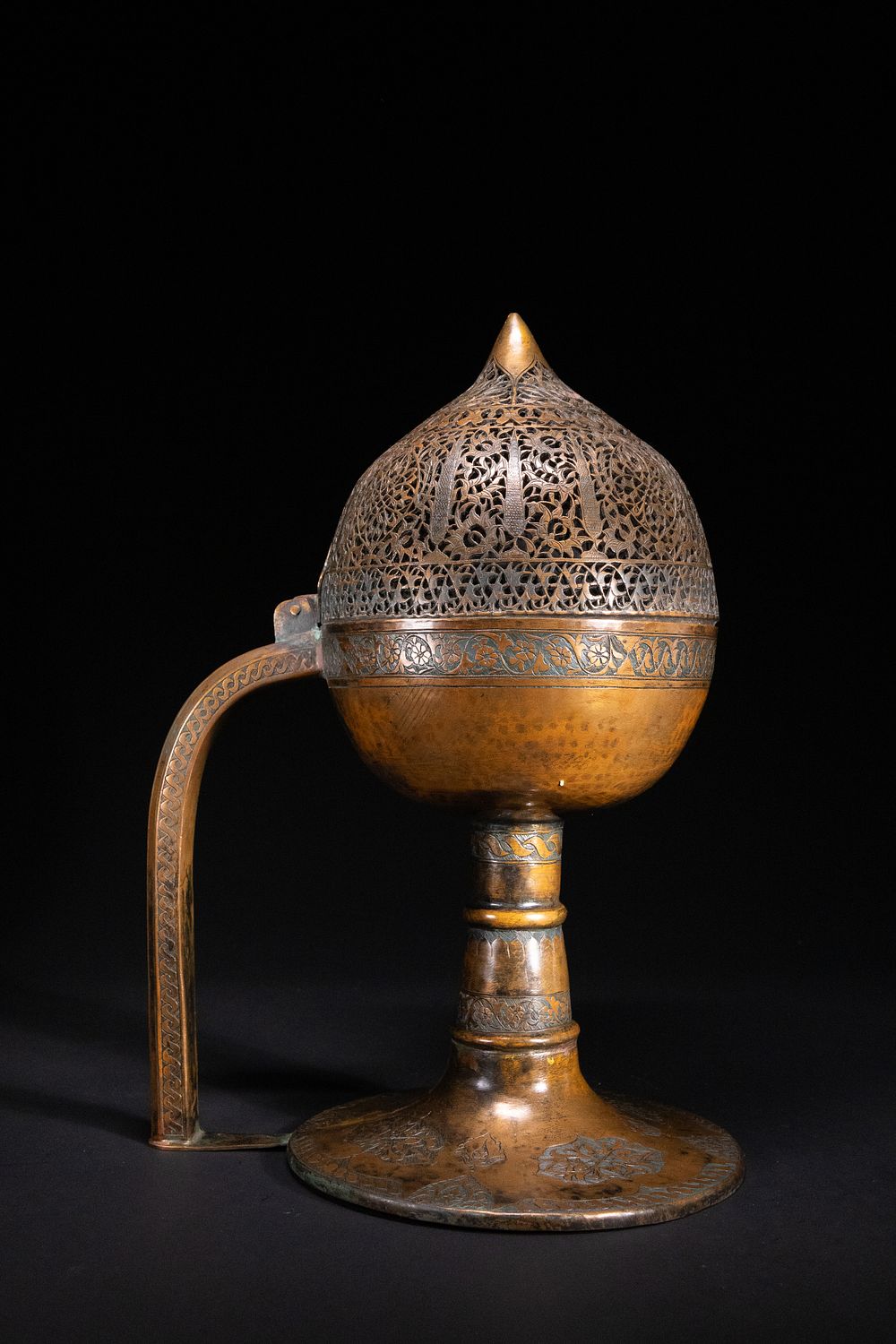 Lot 208: An Ottoman Pierced Copper Censer with Engraved Floral...