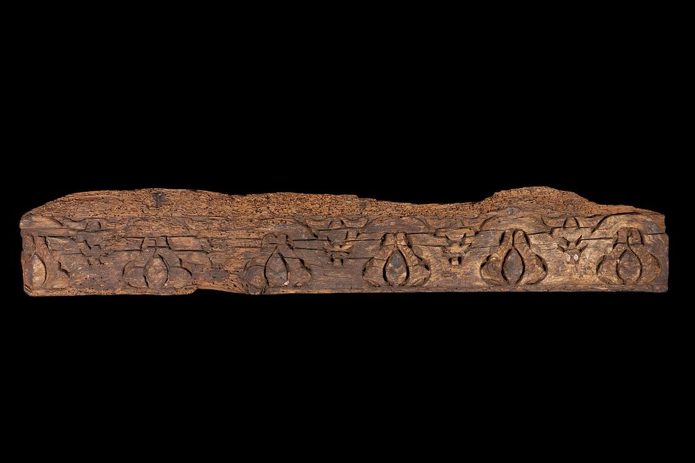 Lot 212: A Spanish Floral Patterned Wood Panel, 11-12th Century.