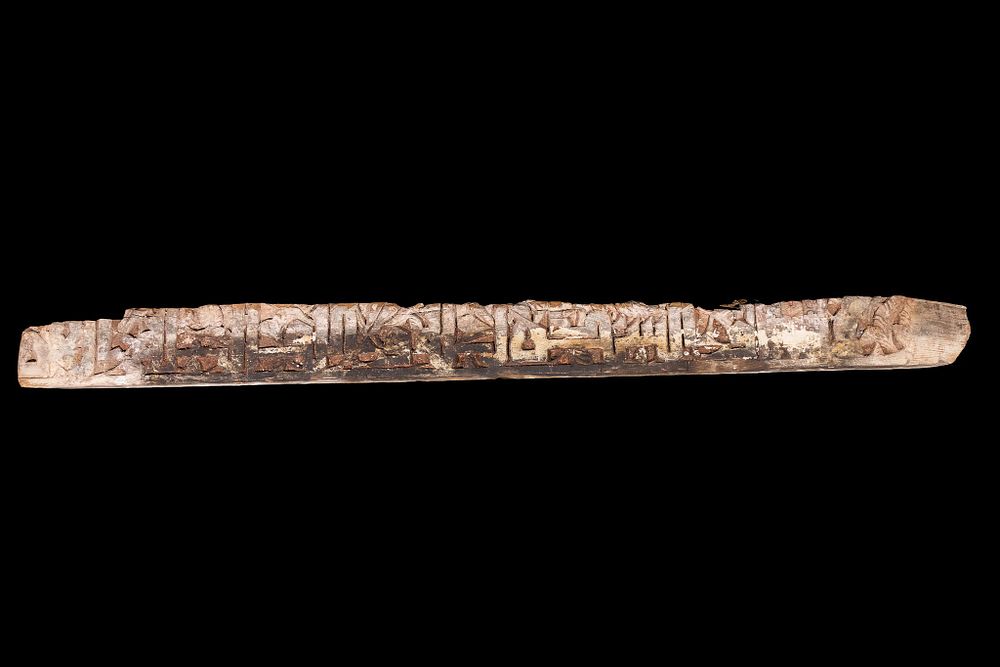 Lot 213: A Spanish Kufic Inscribed Wood Panel, 11th–12th Century.