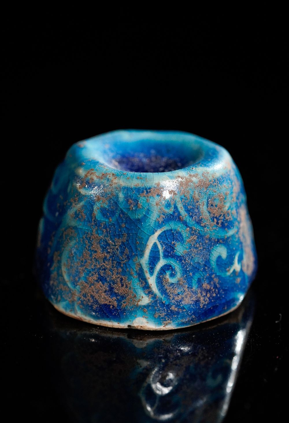 Lot 219: A Fatimid Blue-Glazed Earthenware Pawn Chess Piece, Possibly...