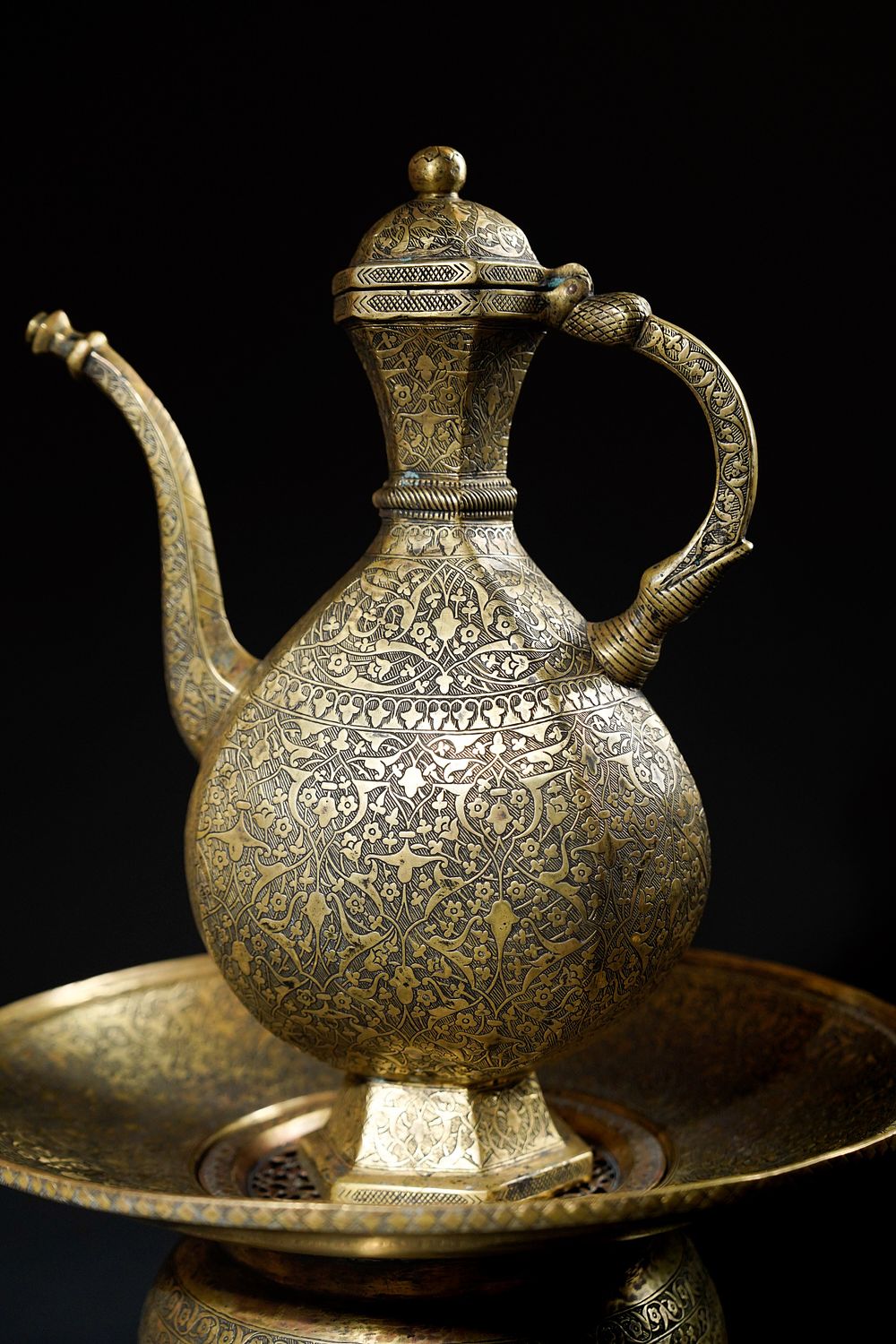 Lot 222: An Indo-Persian Brass Ewer Set with Basin and...