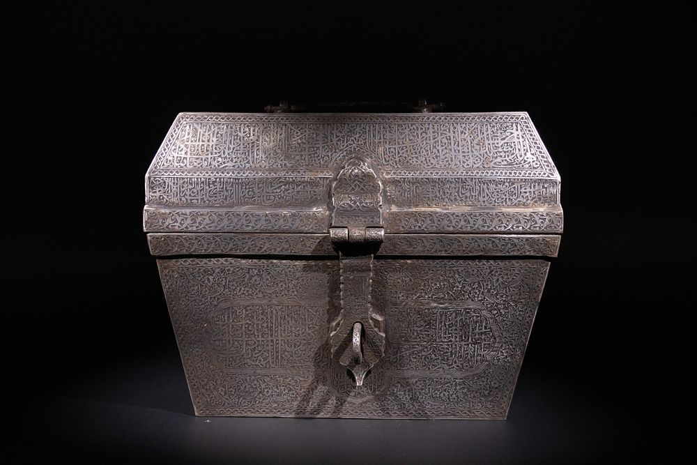 Lot 226: An Islamic Iron Lidded Storage Box with Engraved...