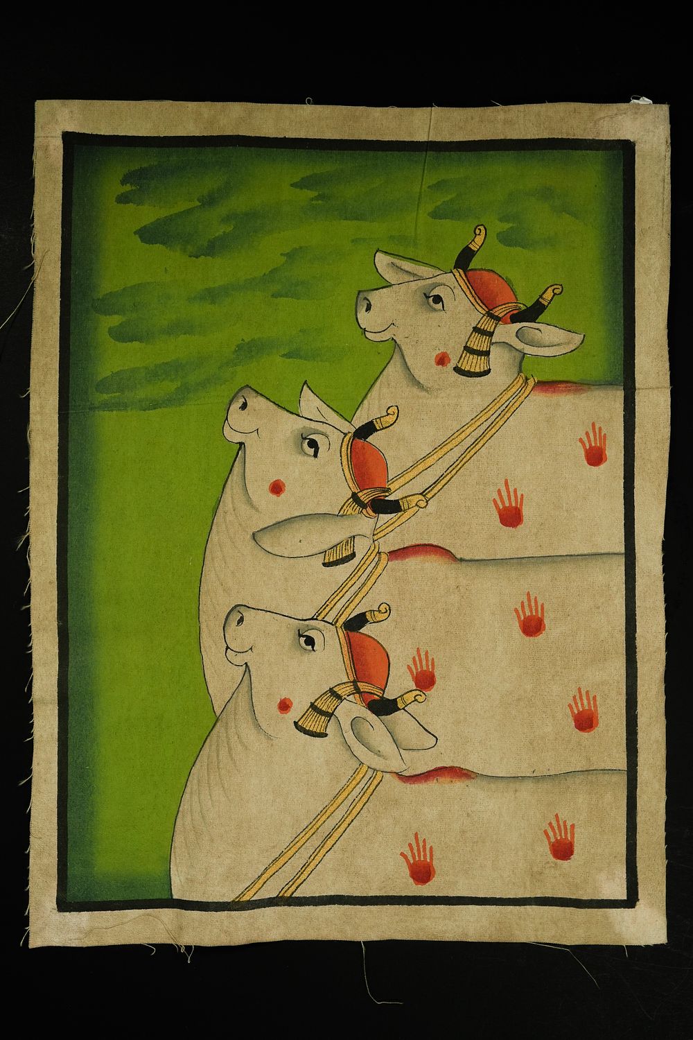 Lot 243: An Indian Pichwai Painting of Three Sacred Cows,...