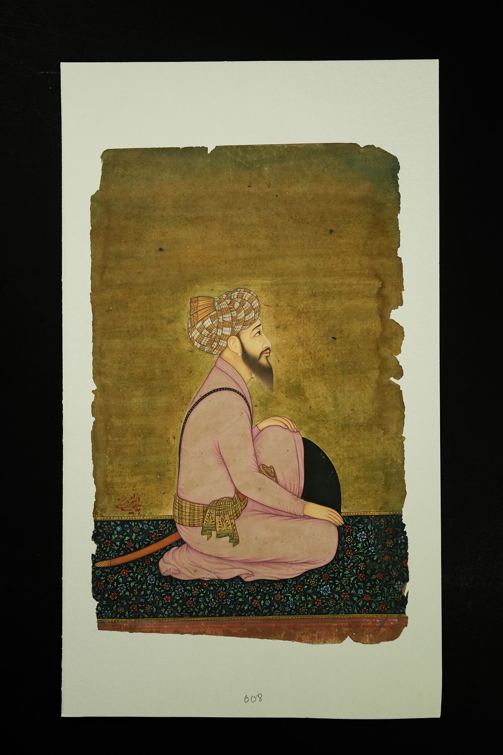Lot 246: An Indian Mughal Portrait of a Seated Nobleman,...