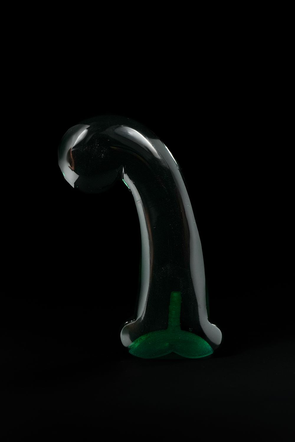 Lot 271: A Mughal Dark Green Glass Dagger Handle.