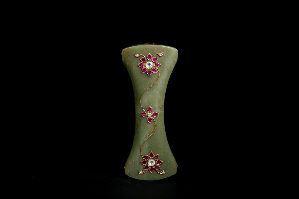 Lot 276: A Mughal Green Jade Dagger Hilt Inlaid with...