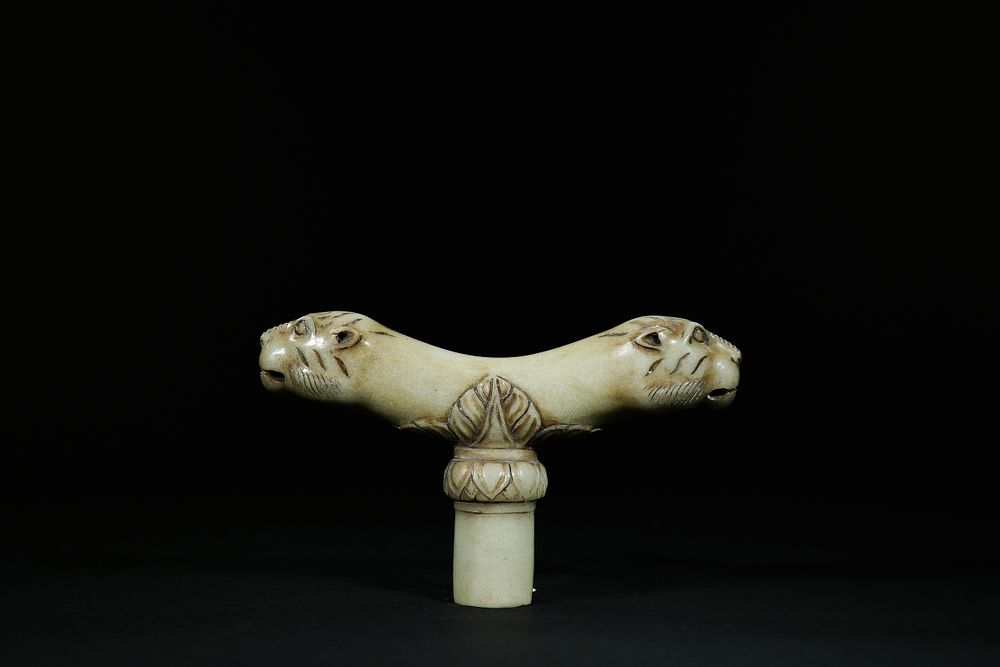 Lot 280: A Mughal Jade Dagger Hilt with Twin Feline...