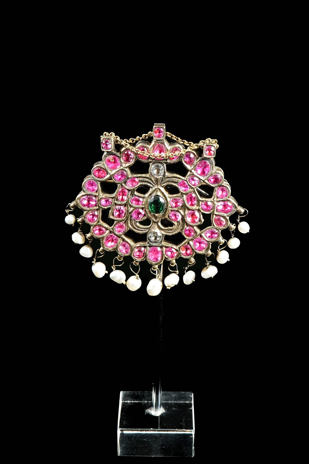 Lot 285: A Mughal Gold Pendant Set with Burmese Rubies,...
