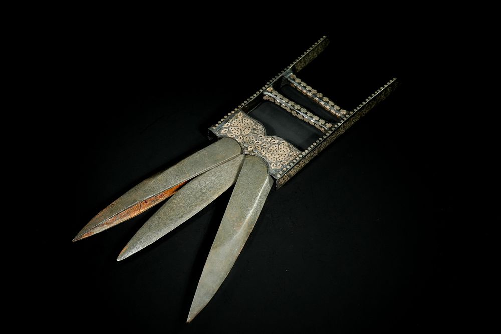 Lot 286: A Damascened Deccan Triple-Blade Steel Katar Dagger.