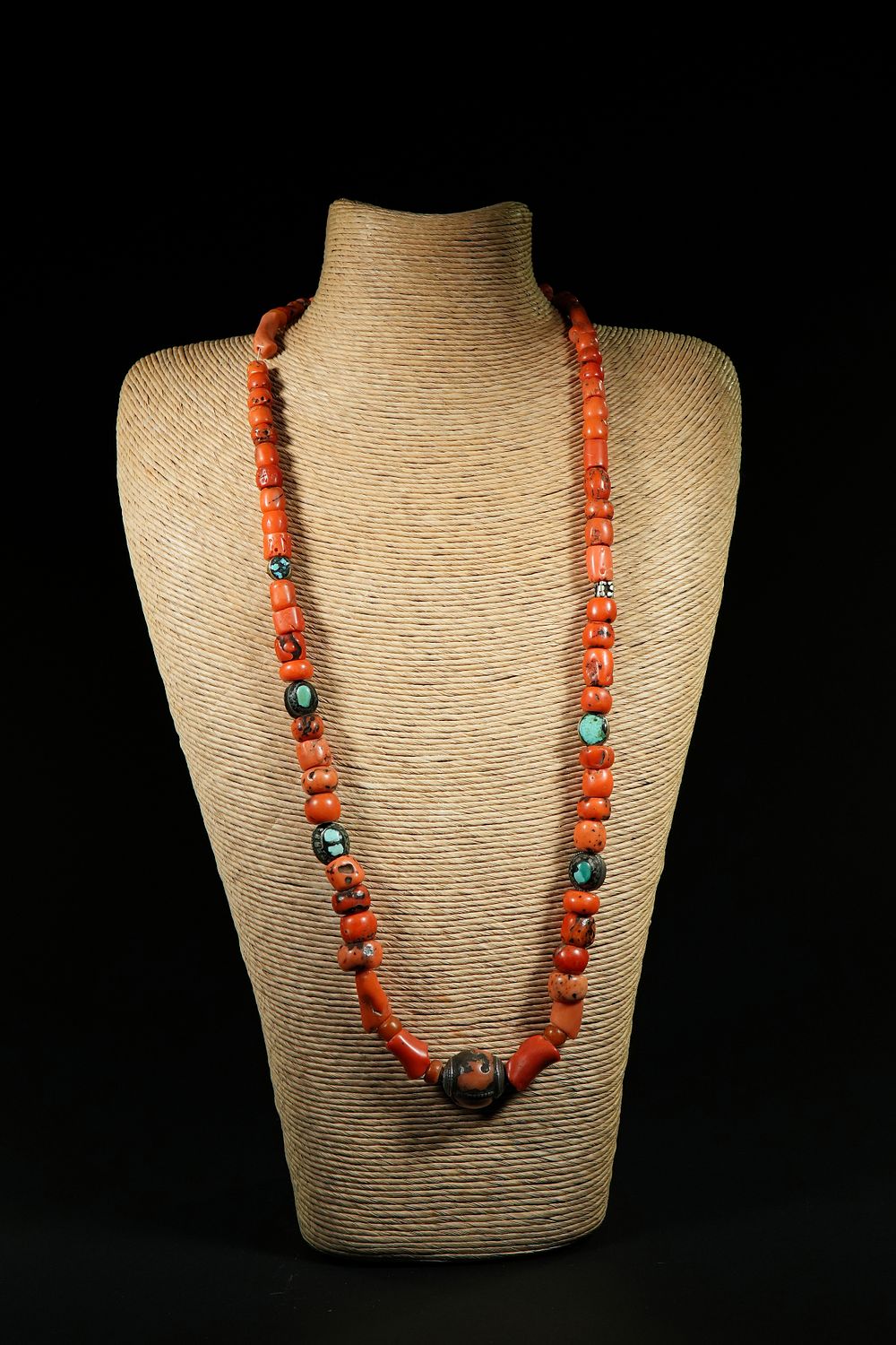 Lot 318: A Tibetan Coral and Turquoise Bead Necklace.