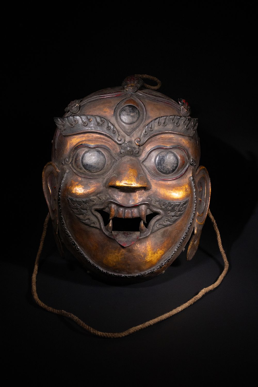 Lot 321: A Tibetan Gilt-Bronze Ritual Mask, 19th Century.
